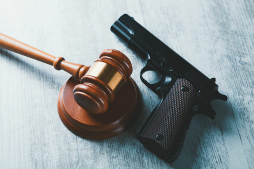 gavel next to gun